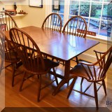 F09. Cherry wood Trestle table and 6 windsor style chairs 42”h. 29”h x 64”w x 38”d 